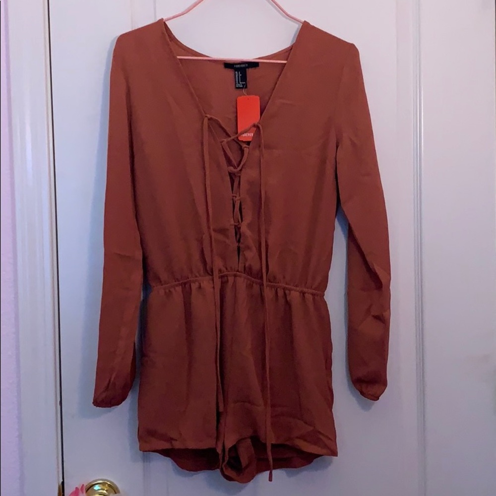 F21- romper with cross-cross front and long sleeve